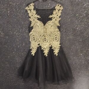 Elegant Black Dress with Gold Lace Overlay